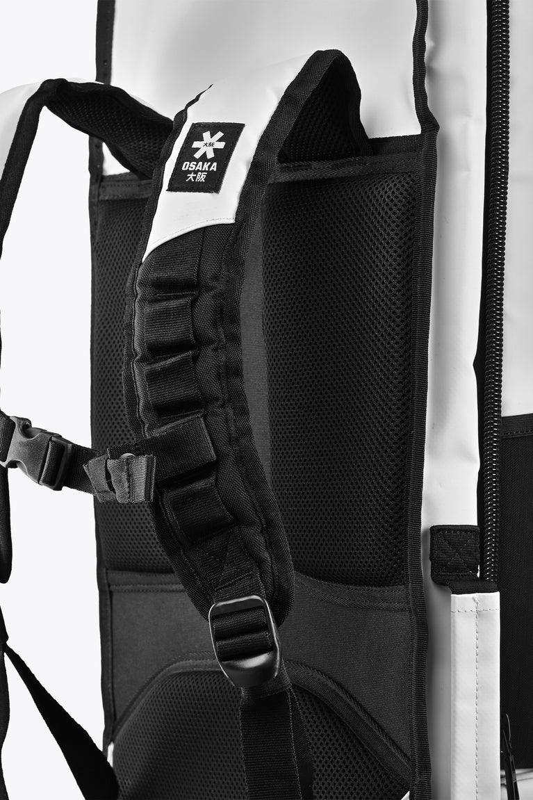 Stickbag interior with padded shoulder strap and black mesh pocket; Osaka branding label.