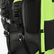 Padded black shoulder straps on a wild lime Osaka stickbag with mesh back panel