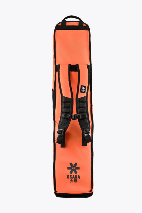 Osaka Pro Tour Stickbag Medium | Orange Tiger Medium orange stickbag with black trim, front ladder straps and zip pocket.