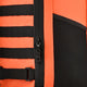 Close-up of orange stickbag panel with zipper, black harness straps and webbing.