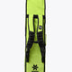 Lime green stickbag with black straps and side carry handles, back view