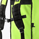 Stickbag shoulder harness with black straps and buckles on lime bag
