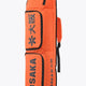 Orange large stickbag with black trim, two compartments, and Osaka logo