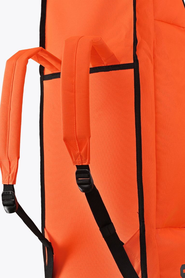 Orange stickbag interior with black adjustable shoulder strap and padded lining