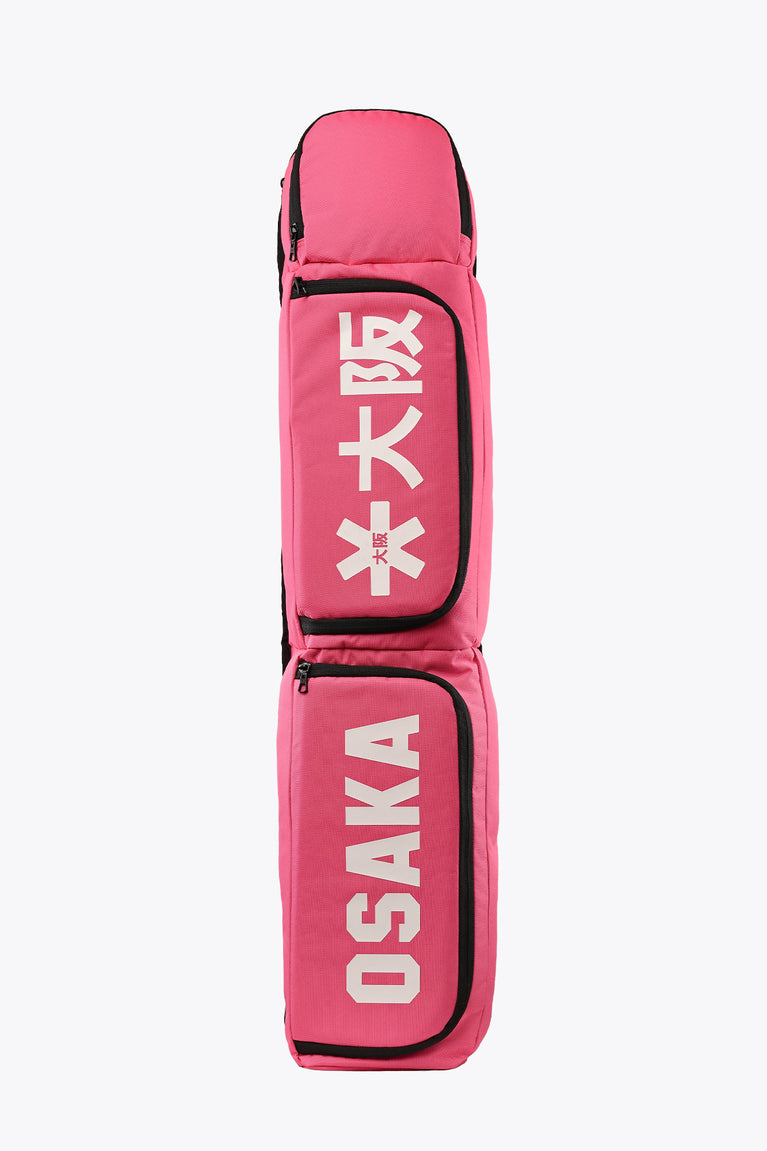 Hot pink medium sports stickbag with double compartments and Osaka logo panel