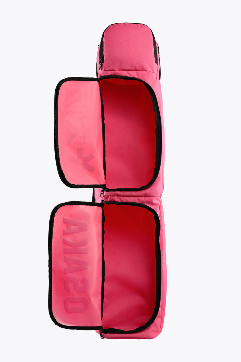Hot pink medium stickbag with two main padded compartments and black edging