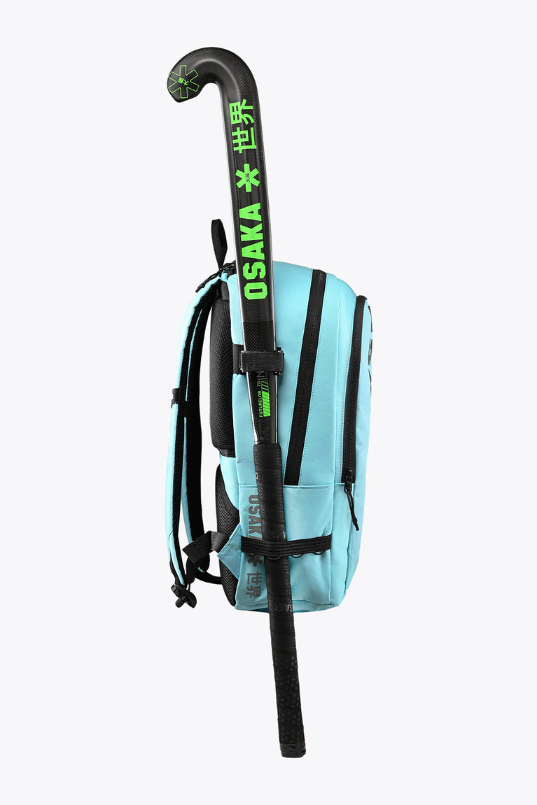 Light blue backpack top handle and hanging strap with Osaka logo patch