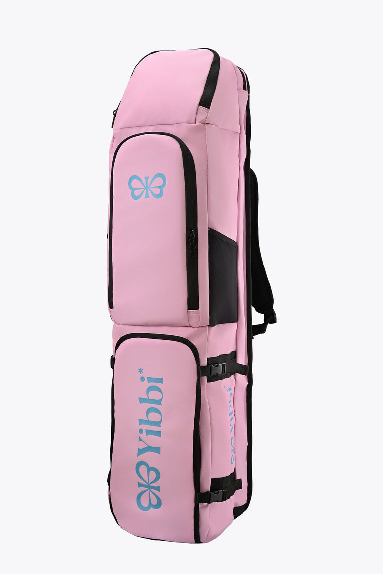 Pastel pink hockey stick bag with black side panels and two compartments