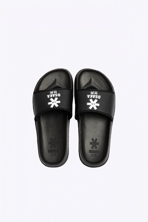 Osaka Sliders | Black Osaka slippers black with logo in white. From above view