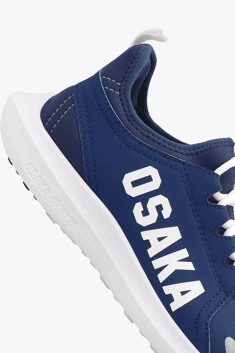 Osaka kids footwear in estate blue with logo in white. Detail logo view