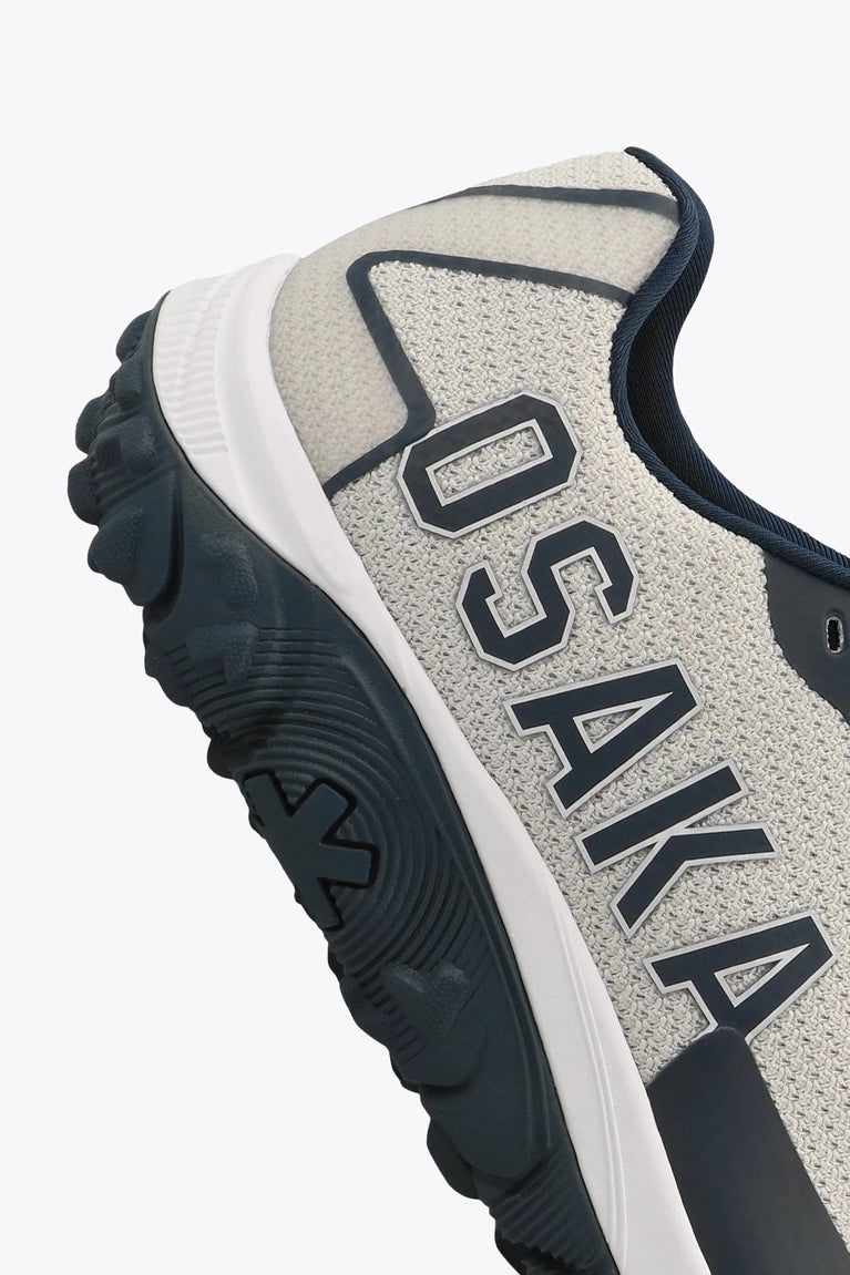 Osaka footwear Kai Mk1 in grey navy with logo in navy. Detail logo view
