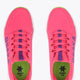 Hot pink kids sneakers with lace-up front, purple eyelets, and green OSAKA lining.