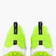 Neon lime lace-up sneakers with black tongue label and white rubber sole