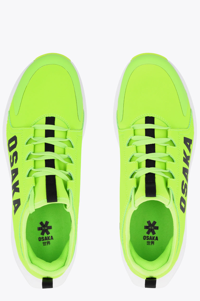 Lime green lace-up sneaker pair with black laces and
