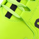 Lime green sneaker upper with black lace stripe inserts and stitched side panel