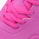 Rose bud pink sneaker close-up: woven texture, lace-up straps, and stitched accents