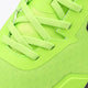 Lime green mesh upper with laces and stitched overlays