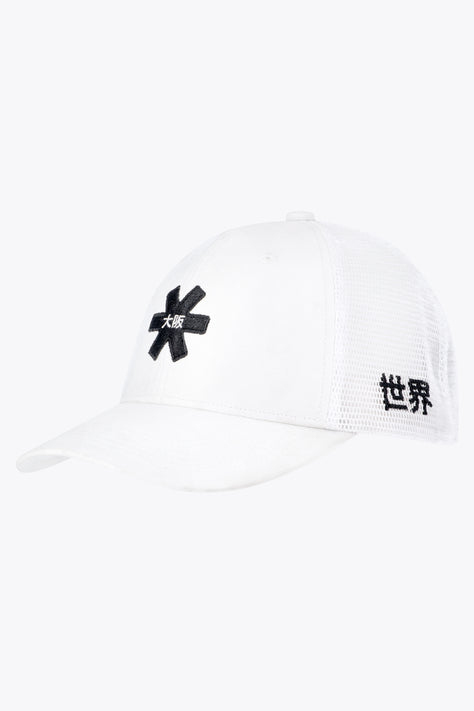 Osaka Trucker Cap | White Osaka trucker cap in white with logo in black. Side view