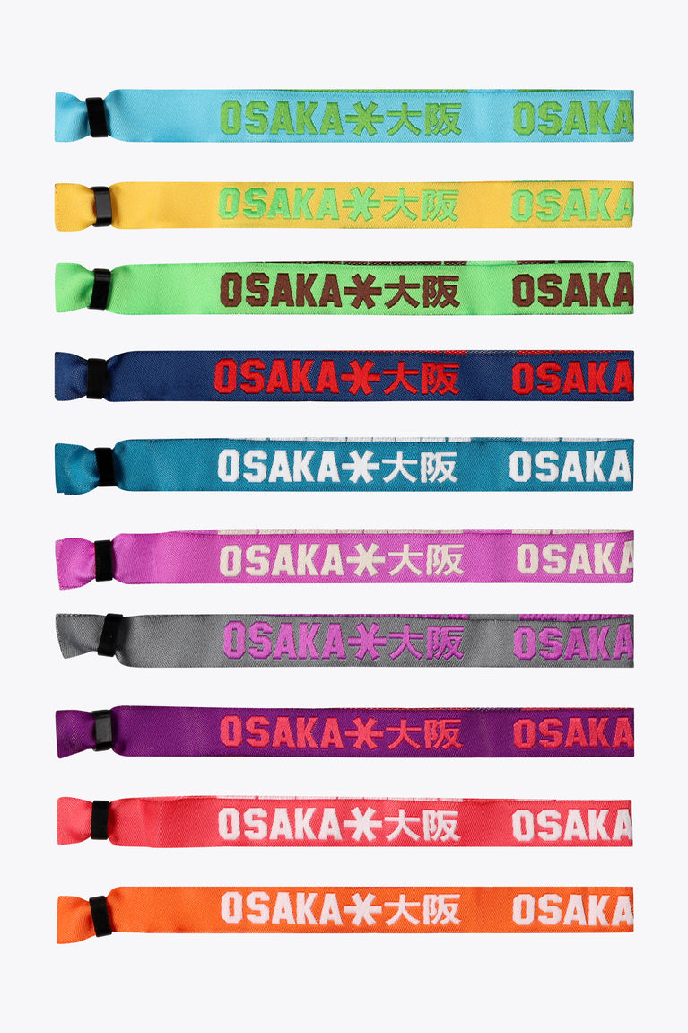 Woven fabric bracelets, multicolor straps with OSAKA print, arranged in a row