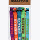 Multicolor woven bracelet set with printed OSAKA text, purple orange green teal