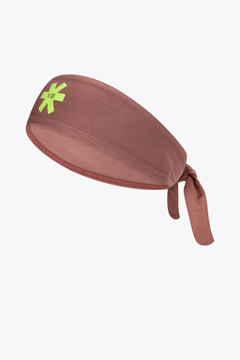 Osaka Sports Bandana | Peppercorn Sports bandana in peppercorn brown with tied end and neon green logo patch
