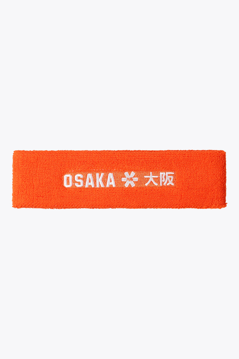 Orange sweatband with Osaka logo and lettering on front