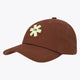 Peppercorn twill baseball cap with embroidered green logo on front