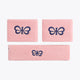 Pastel pink sweatband set, three woven wristbands with dark blue emblem logo.
