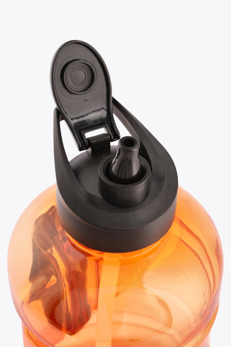 Black flip-top lid with drink nozzle on bright orange translucent bottle