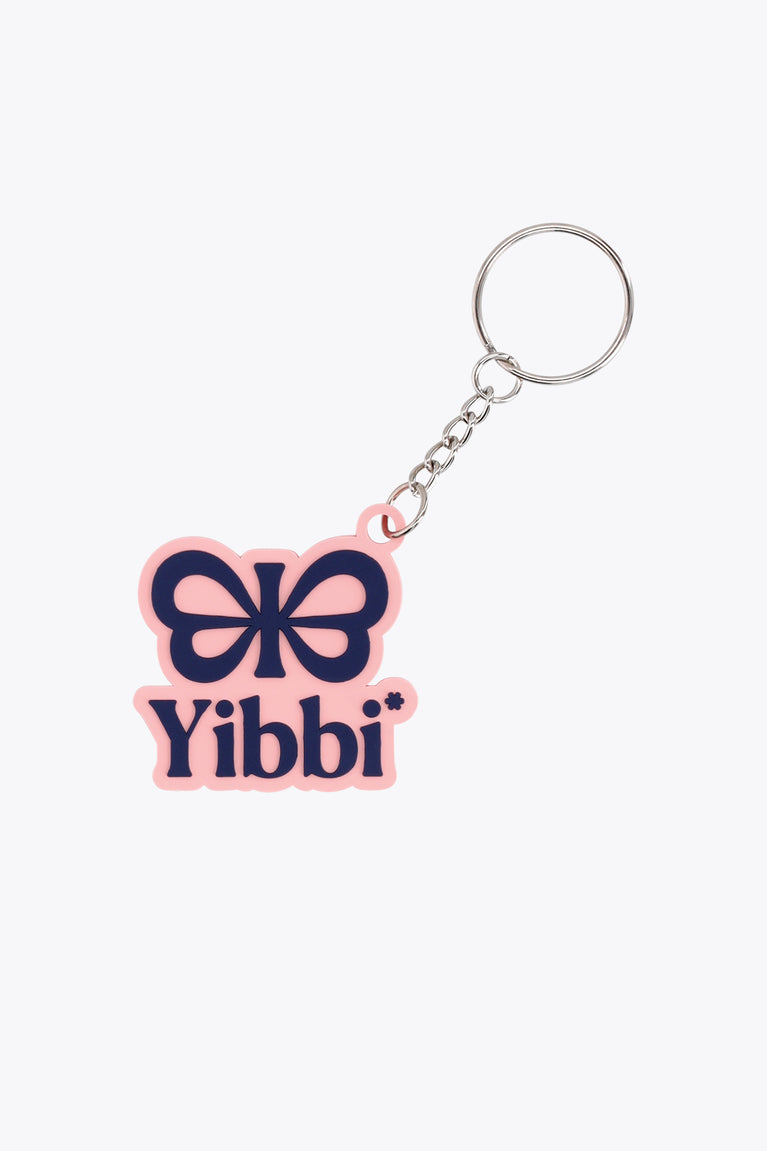 Pastel pink Yibbi keychain charm with bow logo, metal ring and chain