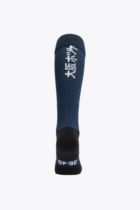 Egara Field Hockey Socks | Navy Egara Socks in navy with Osaka logo in green. Front view