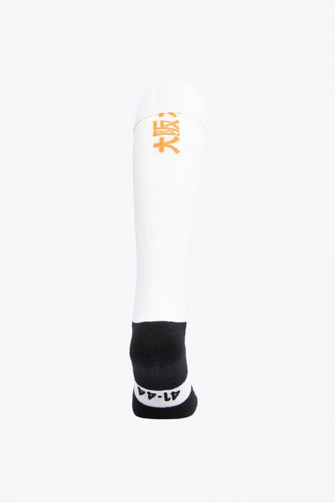 NHM Field Hockey Socks | White NHM Field Hockey Socks in white with Osaka logo in green. Front view