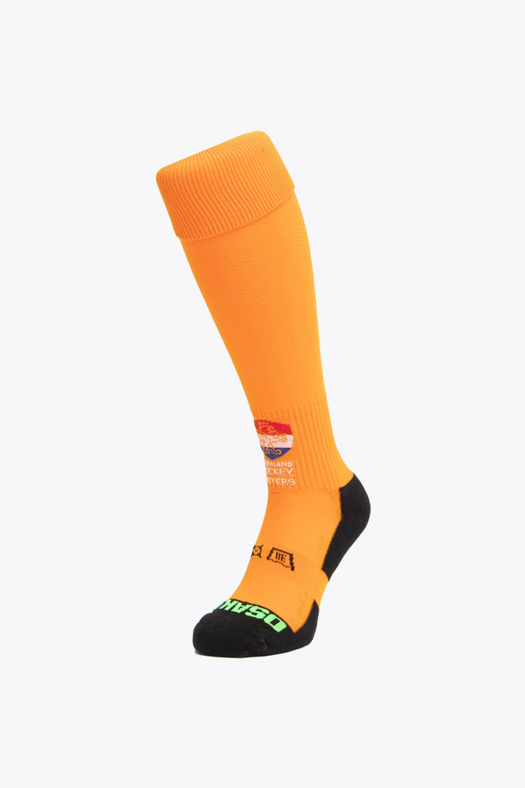 NHM Field Hockey Socks in orange with Osaka logo in green. Front view