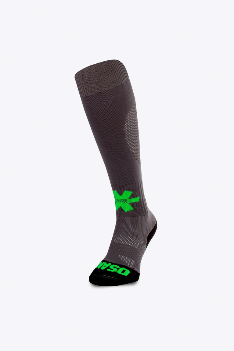 Osaka Field Hockey Socks in grey with Osaka logo in green. Front view