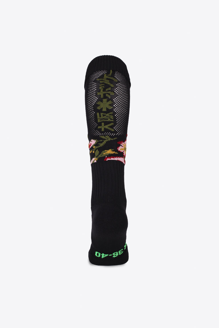 Osaka Field Hockey Socks in vintage flowers with Osaka logo in green. Back view