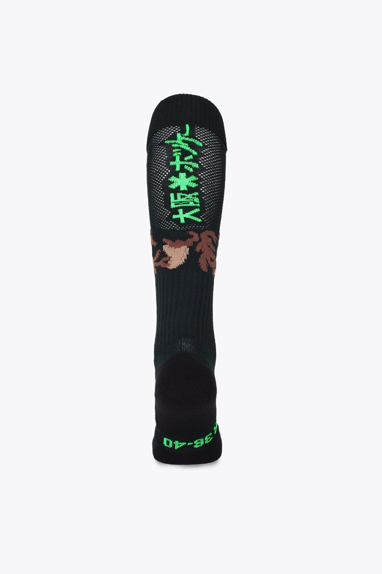 Osaka Field Hockey Socks camouflage with Osaka logo in green. Back view