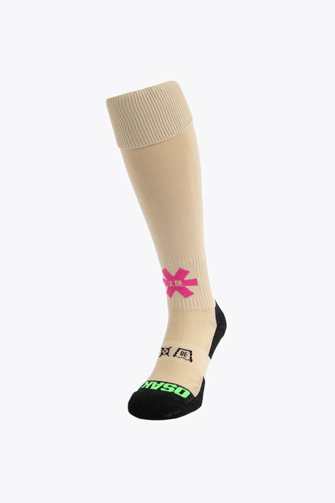 Osaka Field Hockey Socks | Sand Osaka Field Hockey Socks in sand with Osaka logo in green. Front view