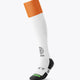 White field hockey socks with orange cuff and black heel and toe