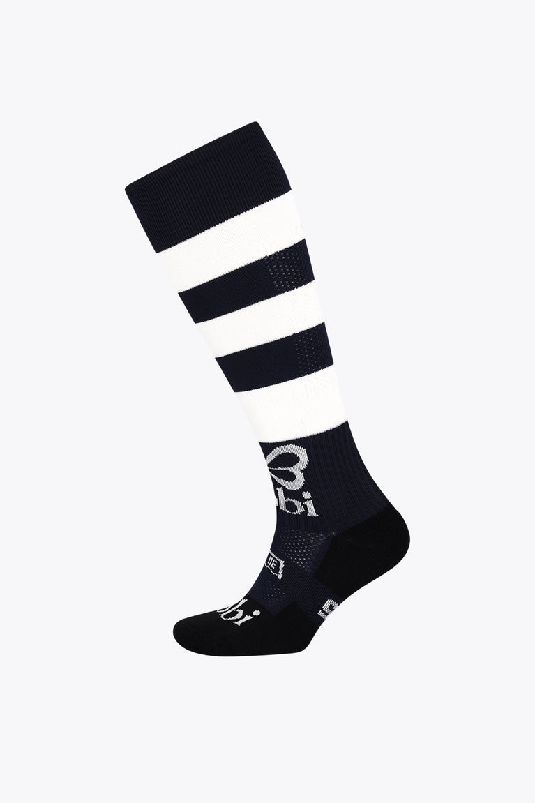 Yibbi field hockey crew socks in navy with white stripes and logo on foot