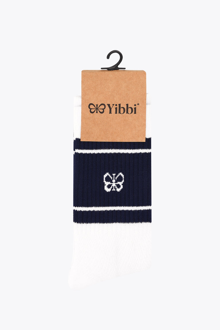 Yibbi navy-and-white sport socks on hanger with striped cuff and logo