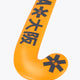Orange indoor hockey stick blade with Osaka text and black graphic icons