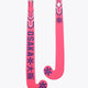 Hot pink indoor hockey stick with mid bow and patterned shaft, curved toe tip