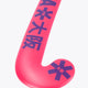 Hot pink indoor hockey stick toe curve with dark graphic icons and mid-bow shape