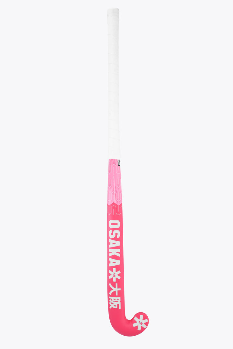 Hot pink field hockey stick with small star logo on lower shaft