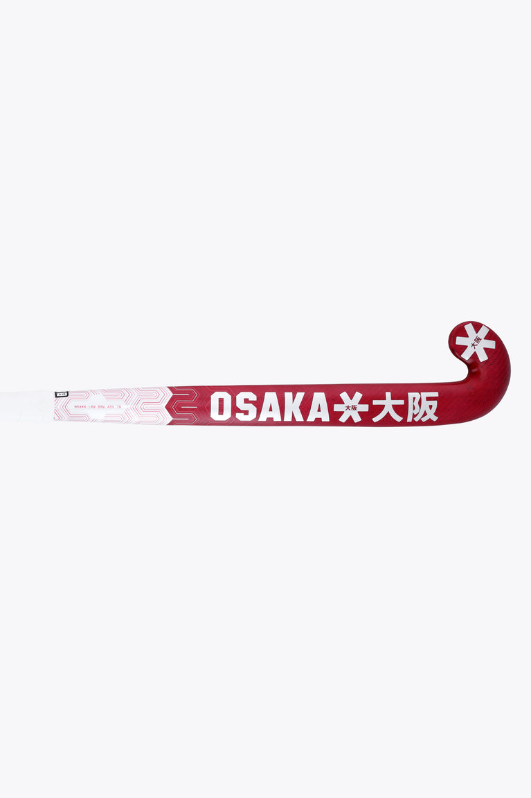 Hot pink low-bow field hockey stick blade with OSAKA branding