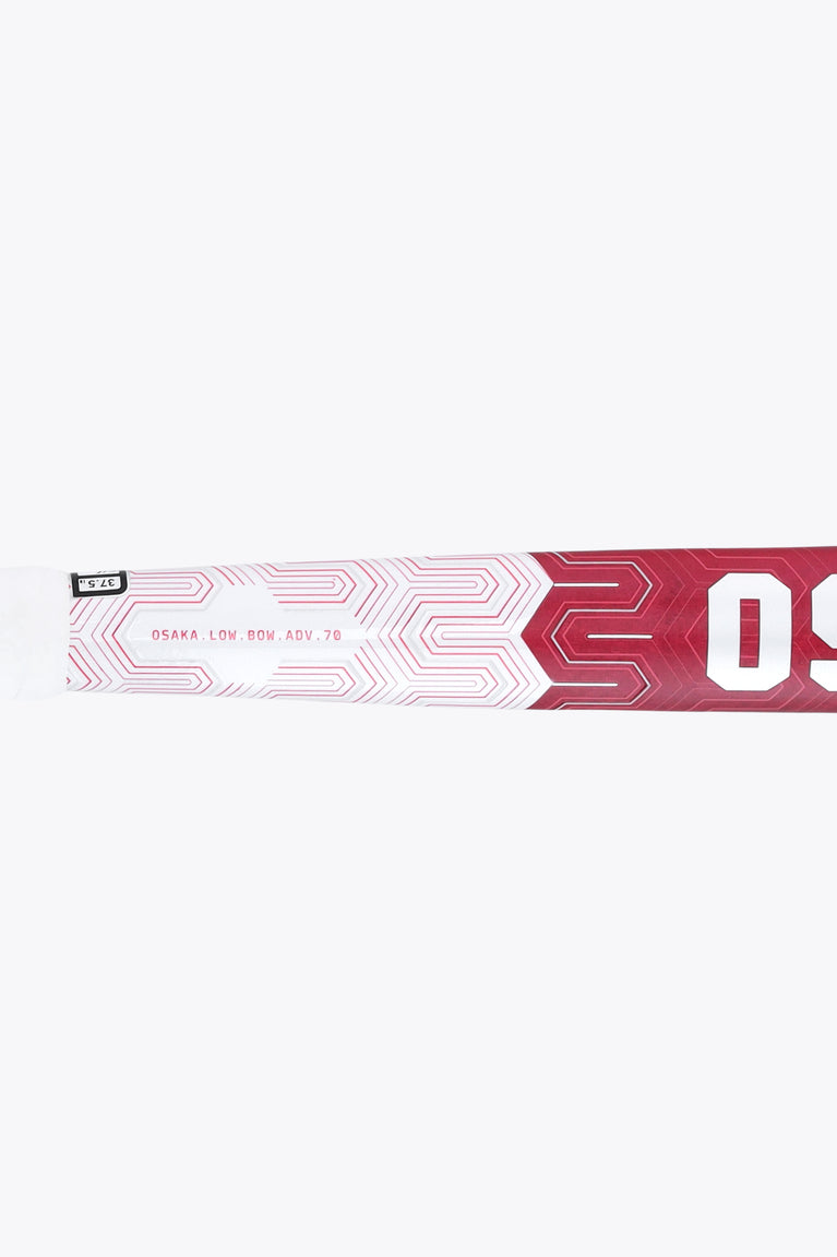 Hot pink and white field hockey stick with OSAKA side text and stripes