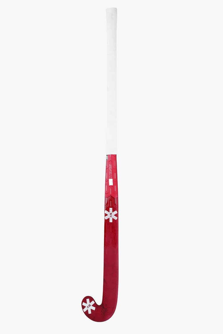 Hot pink field hockey stick shaft with white grip and dark pink curved blade tip