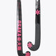 Black field hockey stick with hot pink low-bow head and grip tape