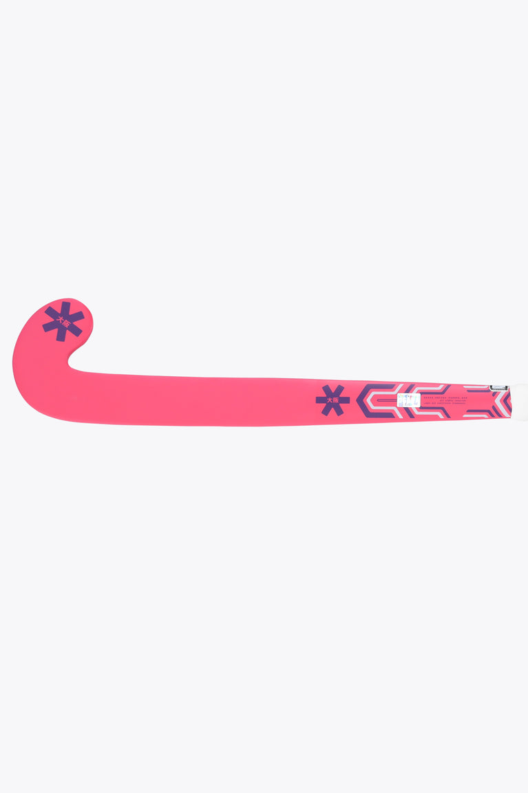 Hot pink field hockey stick blade from the side with geometric accents