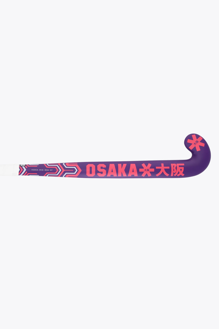 Royal purple hockey stick blade with OSaka branding and red patterned accents.